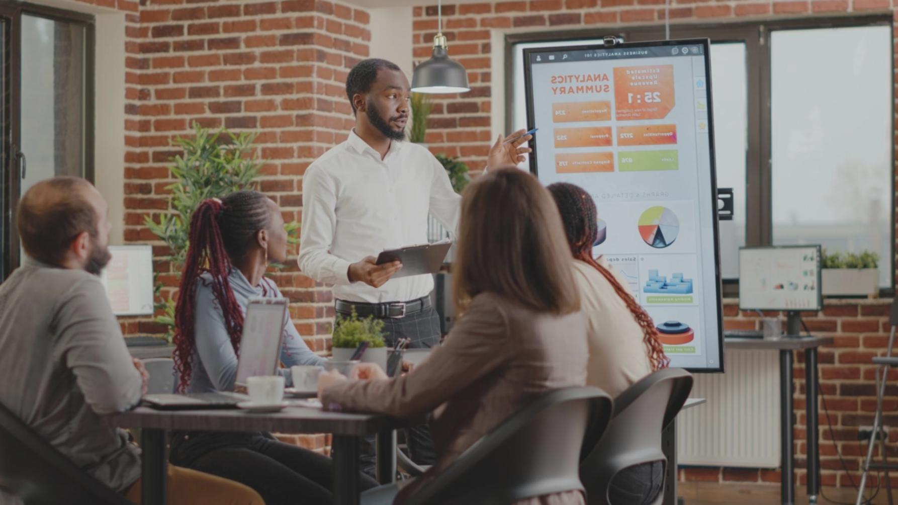Students learning budget tracking techniques with modern financial planning tools